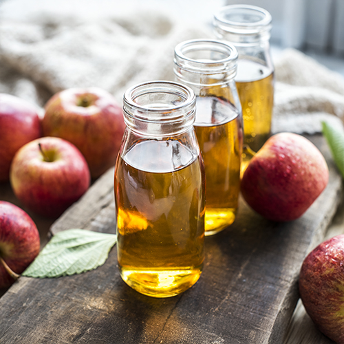 Balsam do masażu z octem jabłkowym Lotus: naturalna ulga na żylaki, obrzęki i ból nóg