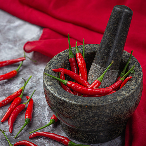 Balsam do masażu z kolokwintą i chilli Lotus: rozgrzewająca ulga na ból mięśni i stawów